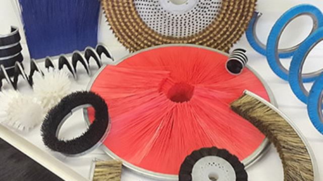 Bespoke brushes from Widdops displayed on a table