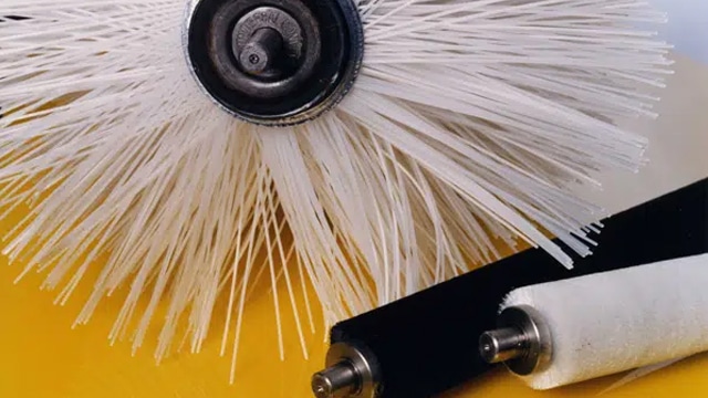 Side view of a widdops white brush roller