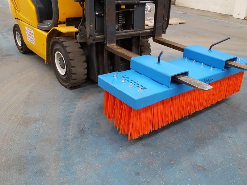 blue and orange widdops forklift sweeper attachment